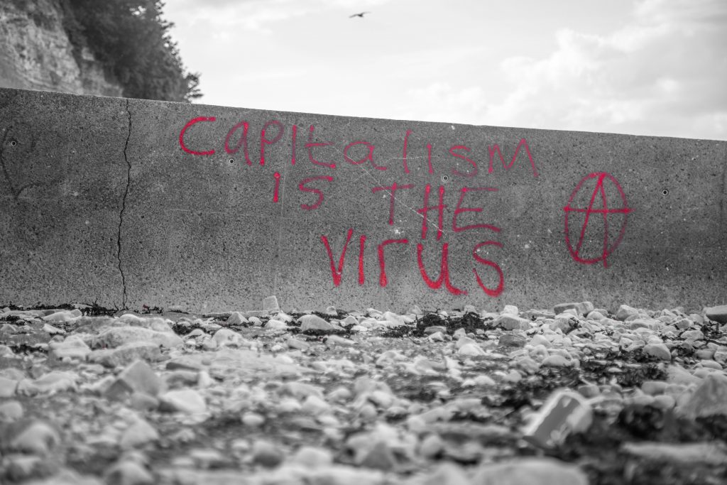 Capitalism is the virus! Graffiti showing anarchy. 