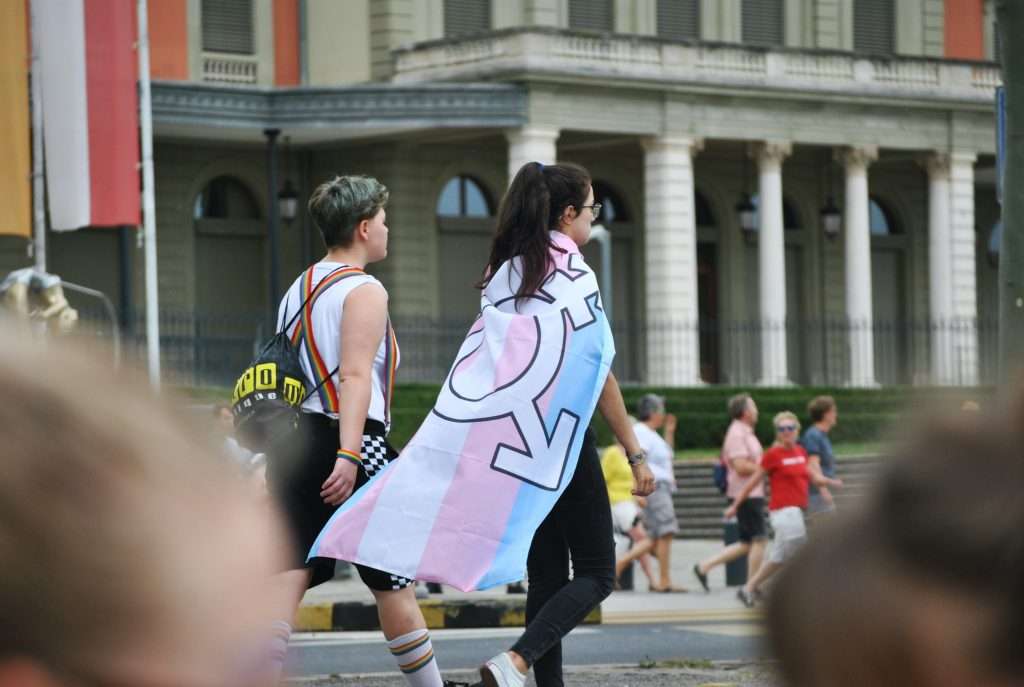 Two people taking part in the Pride parade day in Geneva
