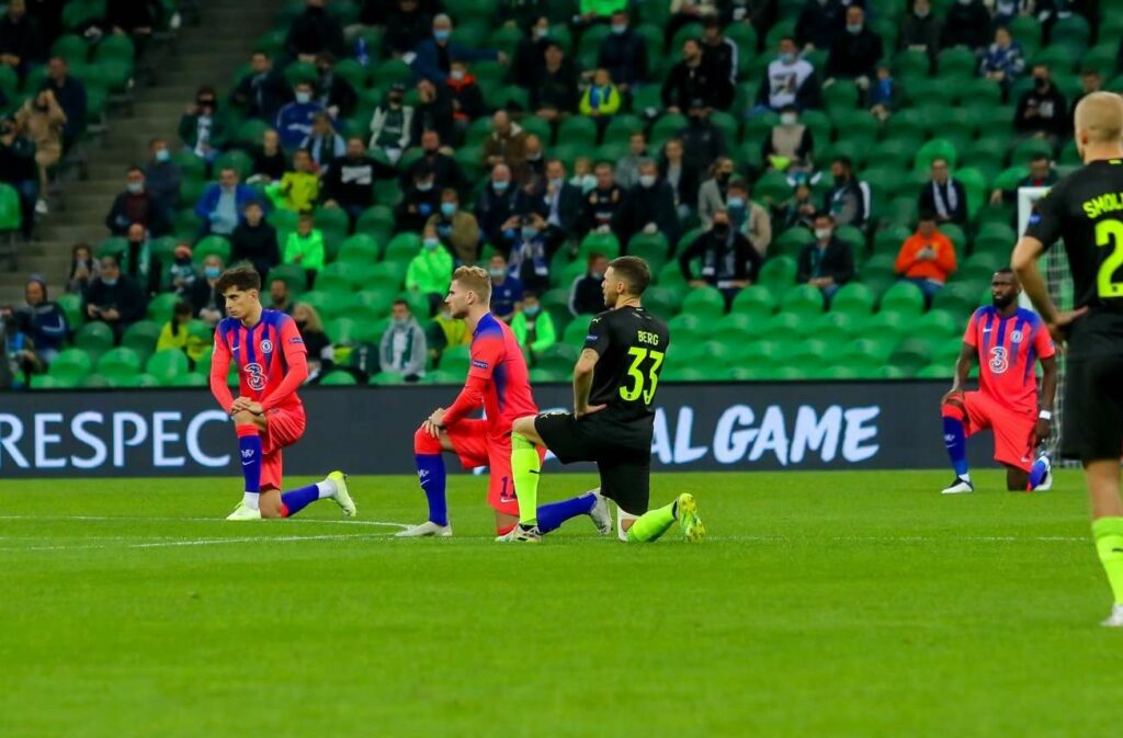 Krasnodar and Chelsea players taking the knee in solidarity with the anti-racism movement during a Champions League match.